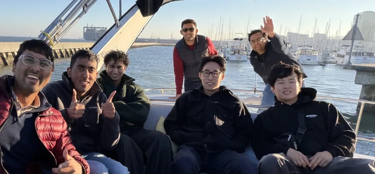Team members enjoying a boat ride